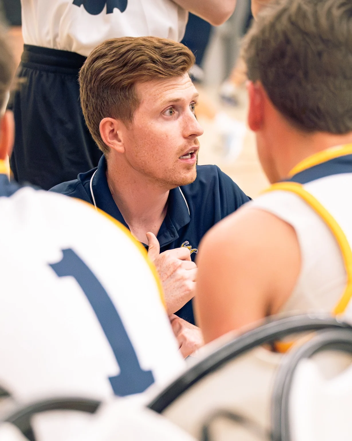 Coach on the sideline during a game