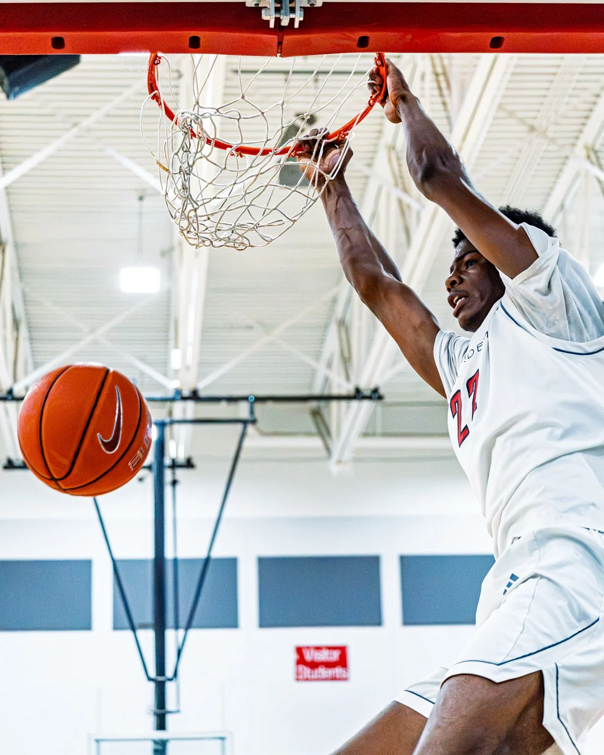 Basketball game action captured during a play